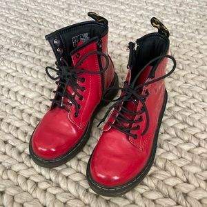 Red Doc Martens, size one in little boys.